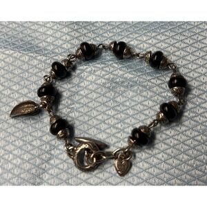 BRIGHTON BLACK BEAD AND SILVER TONE BRACELET. RETIRED.